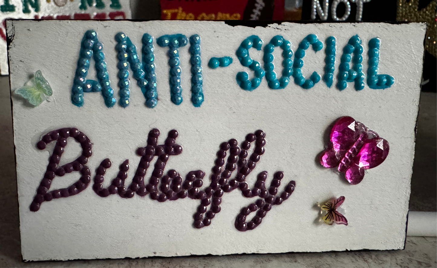 Ani-Social Butterfly sign