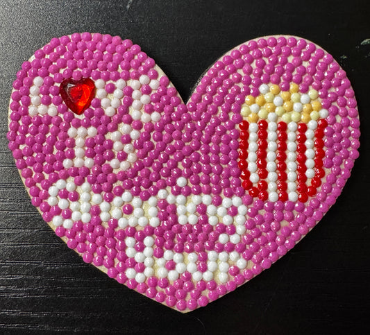 Love is Sharing Your popcorn heart magnet